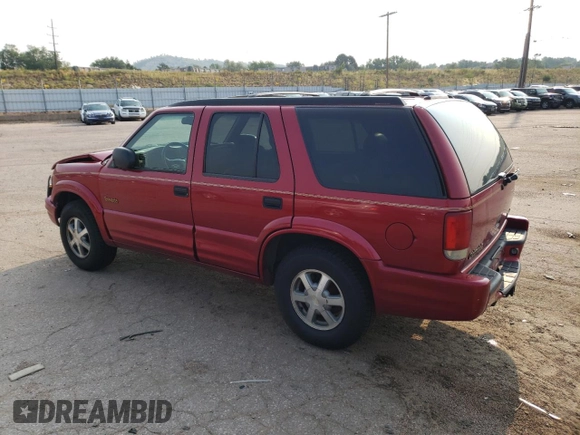 2000 Oldsmobile Bravada z VIN 1GHDT13W6Y2308007, wystawiony jako Copart lot #63862394 z przebiegiem 142 617 mil mil oraz Szkody całkowita. Historia ofert i sprzedaży dostępna na DreamBid. Obrazek 2.