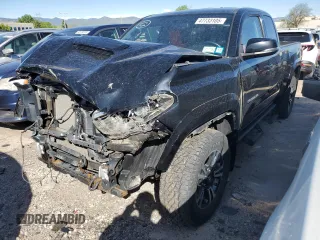 2017 Toyota Tacoma SR5 with VIN 5TFSZ5AN5HX048554, listed as a Copart auction lot 47733105 with 84,812 mi miles and Salvage title. Bid and sale history available at DreamBid. Image 1.