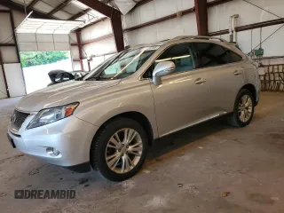 2010 Lexus RX 450h with VIN JTJBC1BAXA2415678, listed as a Copart auction lot 62128395 with 197,524 mi miles and Clean title. Bid and sale history available at DreamBid. Image 1.