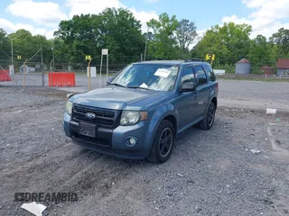 2011 Ford Escape XLT with VIN 1FMCU0D74BKA42232, listed as a IAAI auction lot 42144143 with 231,025 mi miles. Bid and sale history available at carsss.com. Image 2.