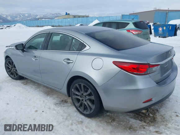 2014 Mazda Mazda6 i Touring with VIN JM1GJ1V62E1134427, listed as a IAAI auction lot 41550411 with 112,804 mi miles. Bid and sale history available at carsss.com. Image 3.