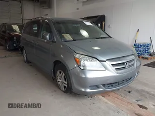 2007 Honda Odyssey EX with VIN 5FNRL38447B008766, listed as a IAAI auction lot 41178878 with 188,054 mi miles and . Bid and sale history available at DreamBid. Image 1.