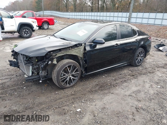 2022 Toyota Camry SE with VIN 4T1G11AK4NU640970, listed as a IAAI auction lot 41124147 with 33,472 mi miles and . Bid and sale history available at DreamBid. Image 2.