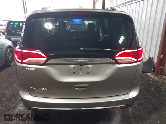 2017 Chrysler Pacifica Touring L with VIN 2C4RC1BG5HR565540, listed as a IAAI auction lot 41999464 with 110,056 mi miles and . Bid and sale history available at DreamBid. Image 16.