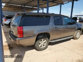 2013 GMC Yukon XL SLT with VIN 1GKS1KE09DR305240, listed as a Copart auction lot 53143565 with 210,872 mi miles and Salvage Title. Bid and sale history available at DreamBid. Image 3.