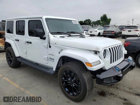 2023 Jeep Wrangler Sahara with VIN 1C4JJXP63PW536694, listed as a Copart auction lot 63409845 with 32,560 mi miles and Salvage title. Bid and sale history available at DreamBid. Image 4.