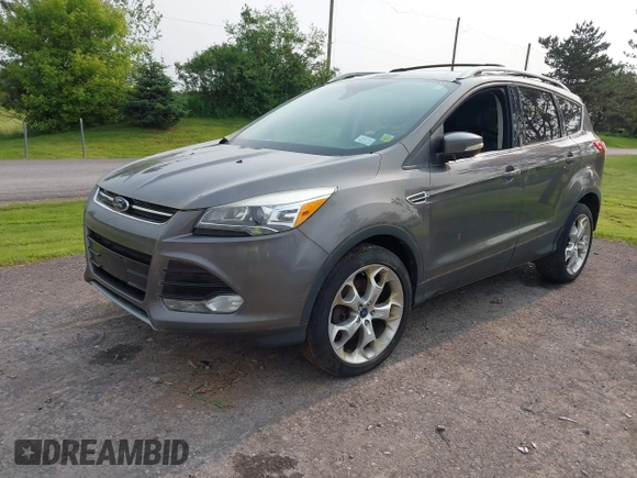 2013 Ford Escape Titanium with VIN 1FMCU9J96DUD74870, listed as a IAAI auction lot 42415332 with 178,651 mi miles and . Bid and sale history available at DreamBid. Image 2.