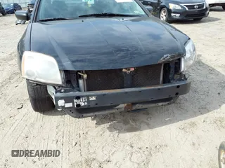 2012 Mitsubishi Galant FE with VIN 4A32B2FF6CE025144, listed as a IAAI auction lot 41781425 with 216,059 mi miles. Bid and sale history available at carsss.com. Image 6.