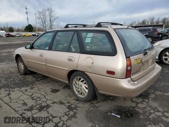 1997 Ford Escort LX with VIN 3FALP15P7VR132710, listed as a Copart auction lot 87546515 with 185,646 mi miles and Salvage Title. Bid and sale history available at DreamBid. Image 2.