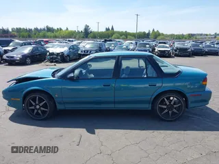1995 Saturn SL with VIN 1G8ZK5277SZ320711, listed as a IAAI auction lot 42115543 with 77,558 mi miles and . Bid and sale history available at DreamBid. Image 14.