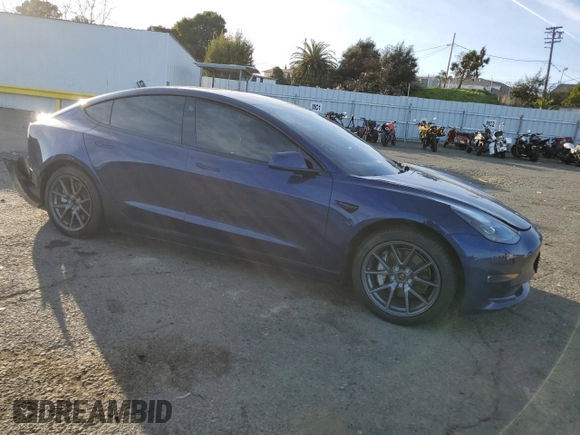 2022 Tesla Model 3 Long Range with VIN 5YJ3E1EB6NF255730, listed as a Copart auction lot 46354235 with 58,470 mi miles and Salvage Title. Bid and sale history available at DreamBid. Image 4.
