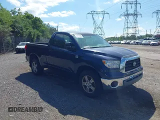 2007 Toyota Tundra with VIN 5TFKT52167X001142, listed as a IAAI auction lot 42312205 with 217,524 mi miles and . Bid and sale history available at DreamBid. Image 1.