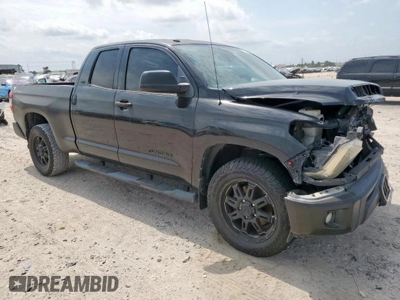 2014 Toyota Tundra SR с VIN 5TFRM5F12EX071952, выставлен на аукционе Copart как лот 57252215 с пробегом 143 706 миль миль и Списание • Salvage title. История ставок и продаж доступна на DreamBid. Изображение 4.