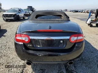 2010 Jaguar XK with VIN SAJWA4GB5ALB36022, listed as a Copart auction lot 56038565 with 101,988 mi miles and Clean Title. Bid and sale history available at DreamBid. Image 6.