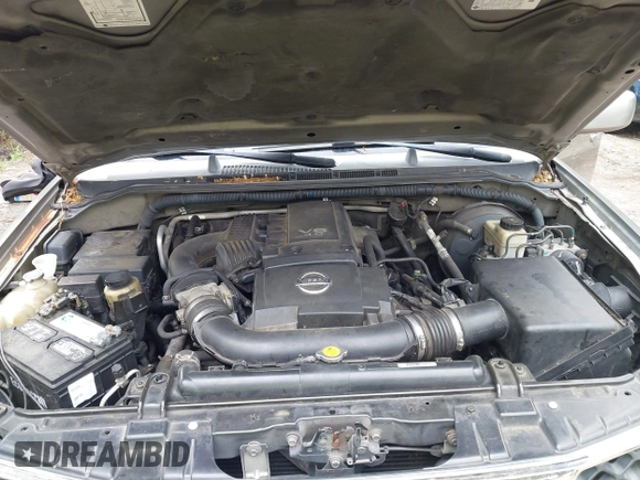 2005 Nissan Pathfinder SE z VIN 5N1AR18WX5C748572, wystawiony jako IAAI lot #42180475 z przebiegiem 291 301 mil mil oraz . Historia ofert i sprzedaży dostępna na DreamBid. Obrazek 10.
