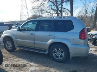 2003 Lexus GX 470 with VIN JTJBT20XX30015034, listed as a IAAI auction lot 41386690 with 234,983 mi miles. Bid and sale history available at carsss.com. Image 14.
