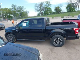 2018 Ford F-150 XL with VIN 1FTEW1E56JKF92265, listed as a IAAI auction lot 42285305 with 95,712 mi miles and . Bid and sale history available at DreamBid. Image 14.
