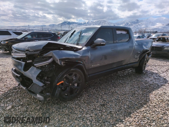 2025 Rivian R1T Adventure z VIN 7FCTGBAA6SN035587, wystawiony jako Copart lot #49142625 z przebiegiem Nie podano mil oraz Szkody całkowita. Historia ofert i sprzedaży dostępna na DreamBid. Obrazek 1.