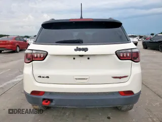2020 Jeep Compass Trailhawk with VIN 3C4NJDDB3LT189398, listed as a Copart auction lot 59376995 with 75,674 mi miles and Salvage title. Bid and sale history available at DreamBid. Image 6.