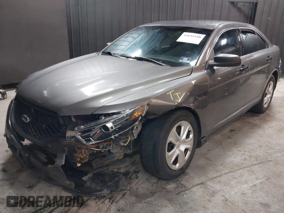 2015 Ford Police Interceptor z VIN 1FAHP2MK4FG119536, wystawiony jako IAAI lot #41635340 z przebiegiem 165 322 mil mil oraz . Historia ofert i sprzedaży dostępna na DreamBid. Obrazek 6.