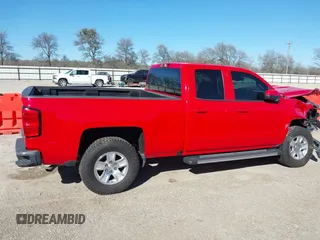 2018 Chevrolet Silverado 1500 LT with VIN 1GCRCREC1JZ342110, listed as a IAAI auction lot 41194372 with 73,186 mi miles and . Bid and sale history available at DreamBid. Image 14.