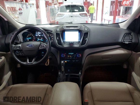 2017 Ford Escape SE with VIN 1FMCU0GD7HUB72357, listed as a IAAI auction lot 42240875 with 101,860 mi miles and . Bid and sale history available at carsss.com. Image 1.