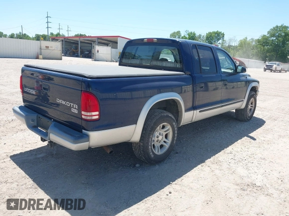 2003 Dodge Dakota SLT with VIN 1D7HL48N63S158682, listed as a IAAI auction lot 41964332 with 278,390 mi miles. Bid and sale history available at carsss.com. Image 4.