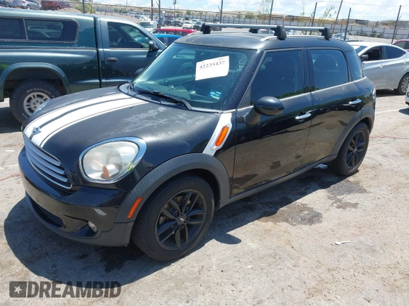 2012 MINI Countryman with VIN WMWZB3C51CWM05034, listed as a IAAI auction lot 42235437 with 131,280 mi miles and . Bid and sale history available at DreamBid. Image 2.