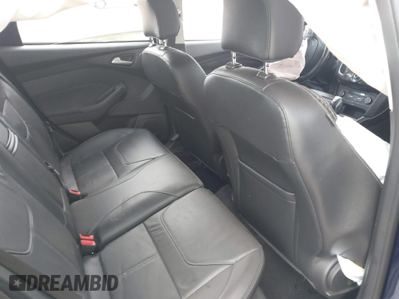 2016 Ford Focus Titanium with VIN 1FADP3J21GL404602, listed as a IAAI auction lot 42270177 with 118,369 mi miles and . Bid and sale history available at DreamBid. Image 8.
