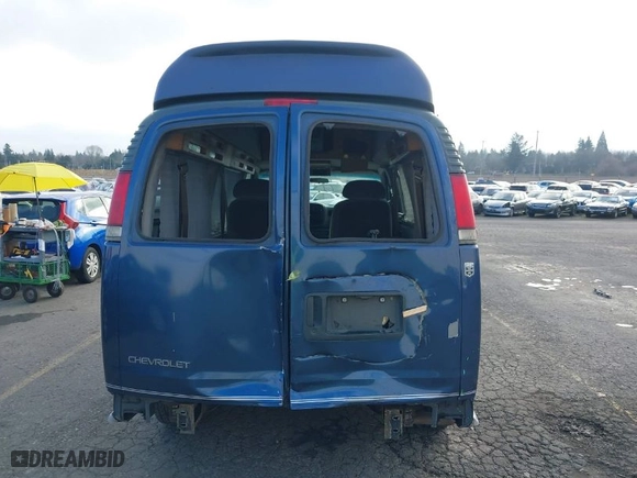 1997 Chevrolet Chevy Cargo Van with VIN 1GBFG15R2V1086016, listed as a IAAI auction lot 41378486 with NaN miles. Bid and sale history available at carsss.com. Image 6.