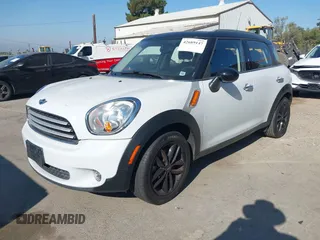 2013 MINI Countryman with VIN WMWZB3C56DWR35601, listed as a IAAI auction lot 42689147 with 80,024 mi miles and . Bid and sale history available at DreamBid. Image 2.