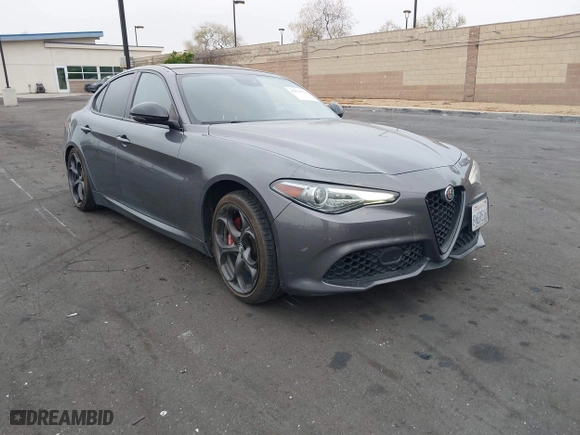 2019 Alfa Romeo Giulia Ti with VIN ZARFAMBN6K7607298, listed as a IAAI auction lot 42020714 with 67,469 mi miles. Bid and sale history available at carsss.com. Image 1.