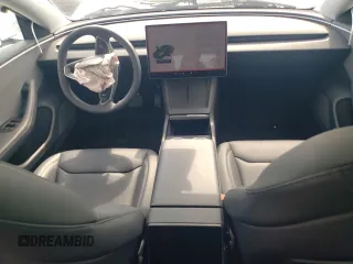 2025 Tesla Model 3 Long Range with VIN 5YJ3E1EA3SF889774, listed as a Copart auction lot 57493425 with 5,167 mi miles and Salvage title. Bid and sale history available at DreamBid. Image 8.