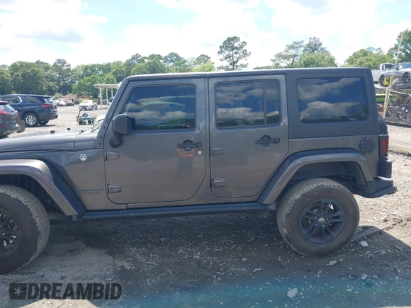 2017 Jeep Wrangler Unlimited Sahara with VIN 1C4BJWEG4HL605213, listed as a IAAI auction lot 42247221 with 104,542 mi miles and . Bid and sale history available at DreamBid. Image 14.
