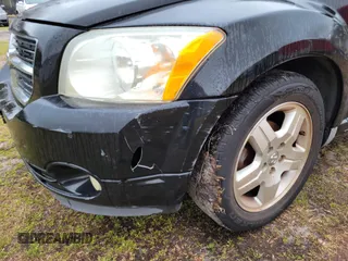 2007 Dodge Caliber SXT z VIN 1B3HB48B27D412371, wystawiony jako IAAI lot #41800631 z przebiegiem 198 594 mil mil oraz . Historia ofert i sprzedaży dostępna na DreamBid. Obrazek 5.
