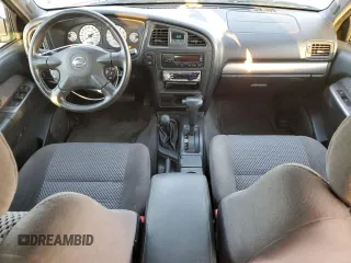 2003 Nissan Pathfinder LE z VIN JN8DR09Y03W813778, wystawiony jako Copart lot #81704494 z przebiegiem 127 986 mil mil oraz Czysty tytuł • Clean title. Historia ofert i sprzedaży dostępna na DreamBid. Obrazek 8.