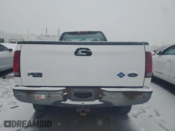 2001 Ford F-150 XL with VIN 2FTPF18Z81CA84228, listed as a Copart auction lot 42434285 with 83,435 mi miles and Salvage title. Bid and sale history available at DreamBid. Image 6.