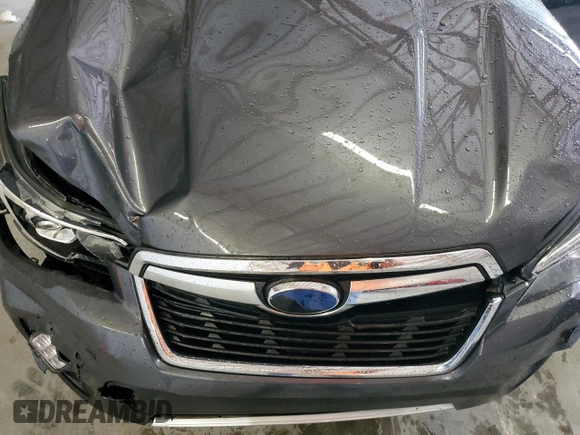 2020 Subaru Forester Touring с VIN JF2SKAXC9LH539653, выставлен на аукционе Copart как лот 60162405 с пробегом 94 061 миль миль и Списание • Salvage title. История ставок и продаж доступна на DreamBid. Изображение 12.