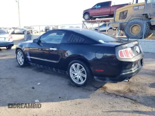 2011 Ford Mustang V6 with VIN 1ZVBP8AM8B5163034, listed as a Copart auction lot 83619534 with 112,949 mi miles and Salvage title. Bid and sale history available at DreamBid. Image 2.
