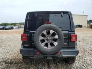 2018 Jeep Wrangler Unlimited Sahara with VIN 1C4HJXEG5JW211272, listed as a Copart auction lot 61765625 with 108,010 mi miles and Salvage title. Bid and sale history available at DreamBid. Image 6.