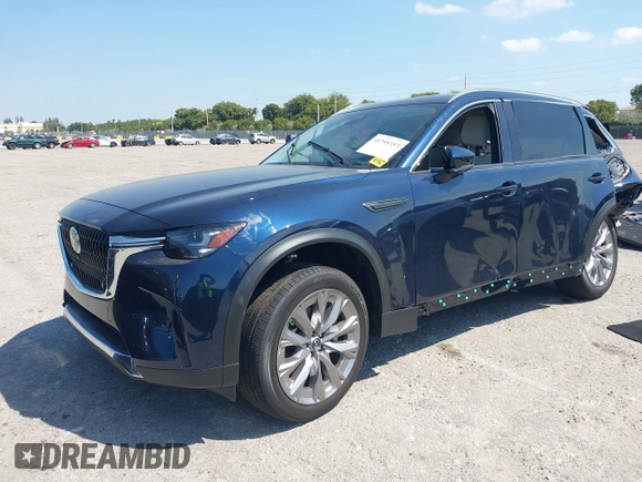 2024 Mazda CX-90 Premium Plus with VIN JM3KKEHD8R1186750, listed as a IAAI auction lot 41795353 with 5,144 mi miles and . Bid and sale history available at DreamBid. Image 2.