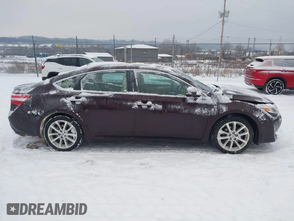 2014 Toyota Avalon Limited with VIN 4T1BK1EB1EU106004, listed as a IAAI auction lot 41341771 with 86,608 mi miles and . Bid and sale history available at DreamBid. Image 13.