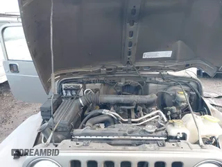 2004 Jeep Wrangler Sport with VIN 1J4FA49S94P711531, listed as a IAAI auction lot 41306863 with 143,720 mi miles and . Bid and sale history available at DreamBid. Image 10.