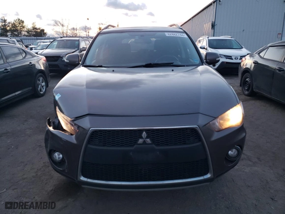 2011 Mitsubishi Outlander LS with VIN JA4JT3AXXBU610616, listed as a Copart auction lot 82882744 with 309,979 mi miles and Clean Title. Bid and sale history available at carsss.com. Image 5.