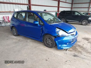2007 Honda Fit Sport z VIN JHMGD38667S014334, wystawiony jako IAAI lot #42349784 z przebiegiem 176 274 mil mil oraz . Historia ofert i sprzedaży dostępna na DreamBid. Obrazek 1.
