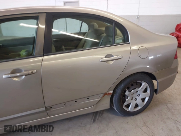 2006 Honda Civic LX z VIN 1HGFA16556L005459, wystawiony jako IAAI lot #41940768 z przebiegiem 178 595 mil mil oraz . Historia ofert i sprzedaży dostępna na DreamBid. Obrazek 6.