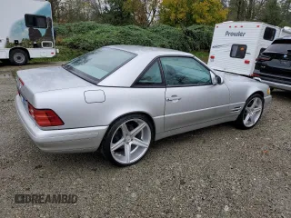 2001 Mercedes-Benz SL-Class with VIN WDBFA68F01F198112, listed as a Copart auction lot 77034114 with 114,049 mi miles and Salvage Title. Bid and sale history available at carsss.com. Image 3.