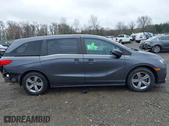 2018 Honda Odyssey EX-L z VIN 5FNRL6H70JB025227, wystawiony jako IAAI lot #41940992 z przebiegiem 95 797 mil mil oraz . Historia ofert i sprzedaży dostępna na DreamBid. Obrazek 13.