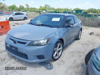 2012 Scion tC with VIN JTKJF5C79C3043661, listed as a IAAI auction lot 42020903 with 184,891 mi miles. Bid and sale history available at carsss.com. Image 2.
