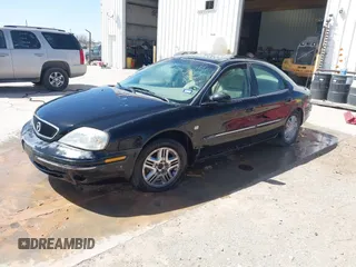 2000 Mercury Sable LS Premium with VIN 1MEFM55SXYA645345, listed as a IAAI auction lot 41778827 with 196,746 mi miles. Bid and sale history available at carsss.com. Image 2.